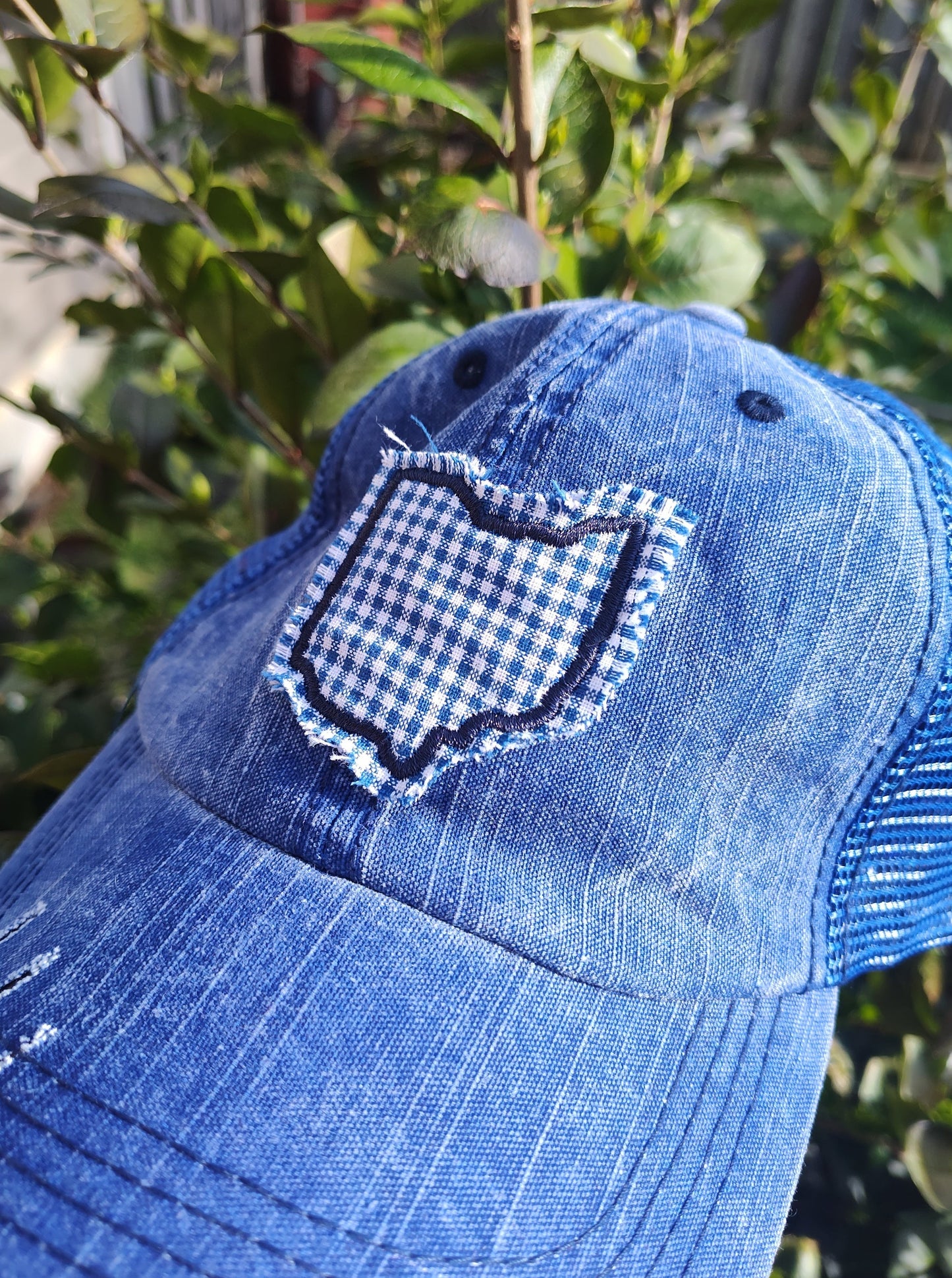 Unstructured, worn-in VINTAGE TRUCKER HATS OHIO PATCH